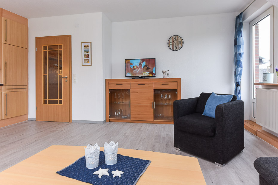 Ferienwohnung „Sternenlicht“ - Wohnzimmer mit integriertem Küchenbereich
