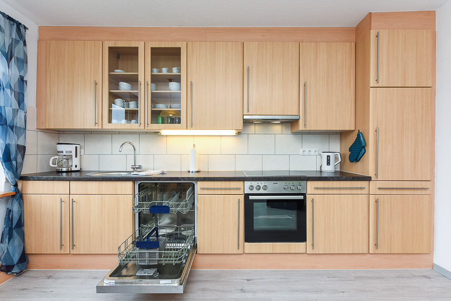 Ferienwohnung „Sternenlicht“ - Wohnzimmer mit integriertem Küchenbereich