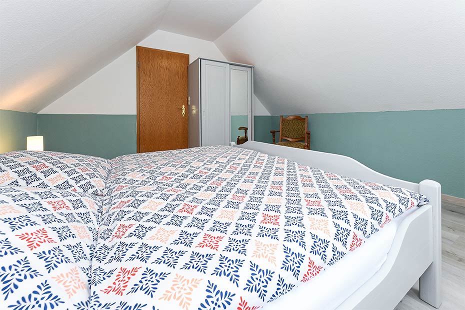 Ferienhaus - Schlafzimmer 1 im Obergeschoss
