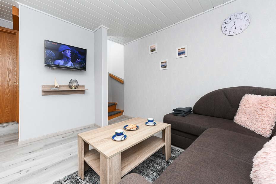 Ferienhaus - Wohnzimmer mit integriertem Küchenbereich