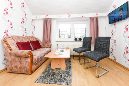 Ferienwohnung I - Wohnzimmer mit integriertem Küchenbereich