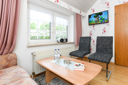 Ferienwohnung I - Wohnzimmer mit integriertem Küchenbereich