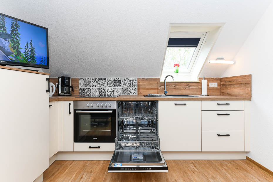 Ferienwohnung „Gänseblümchen“ - Wohnraum mit integrierter Küche