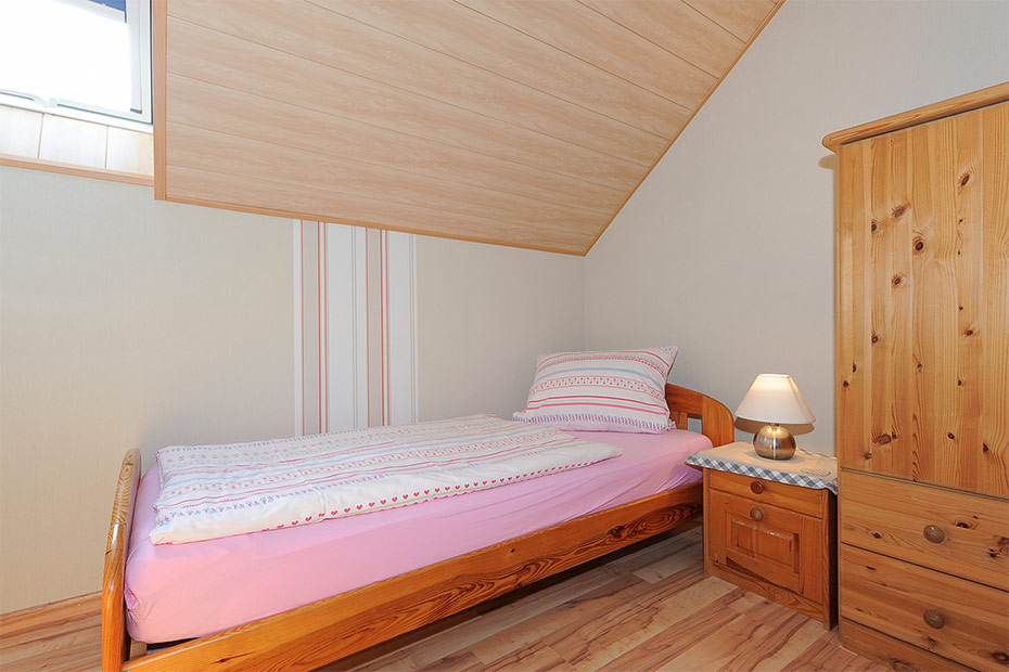 Ferienwohnung „Leuchtturm“ (Nr. 7) - Schlafzimmer 2/Kinderzimmer