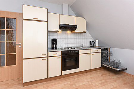 Ferienwohnung „Deichwind“ - Wohnzimmer mit integriertem Küchenbereich