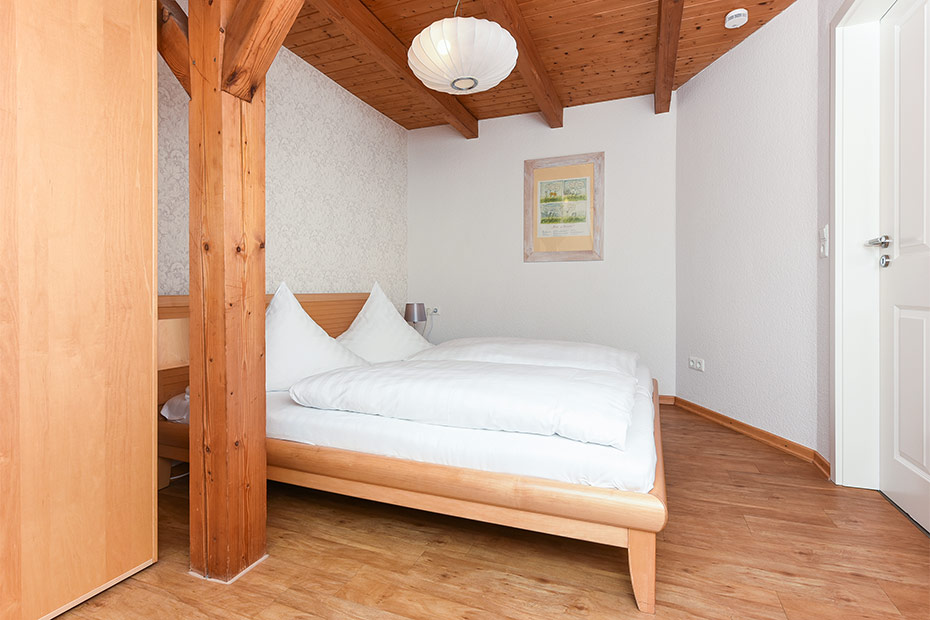 Ferienwohnung Erlenwohnung - Schlafzimmer 1