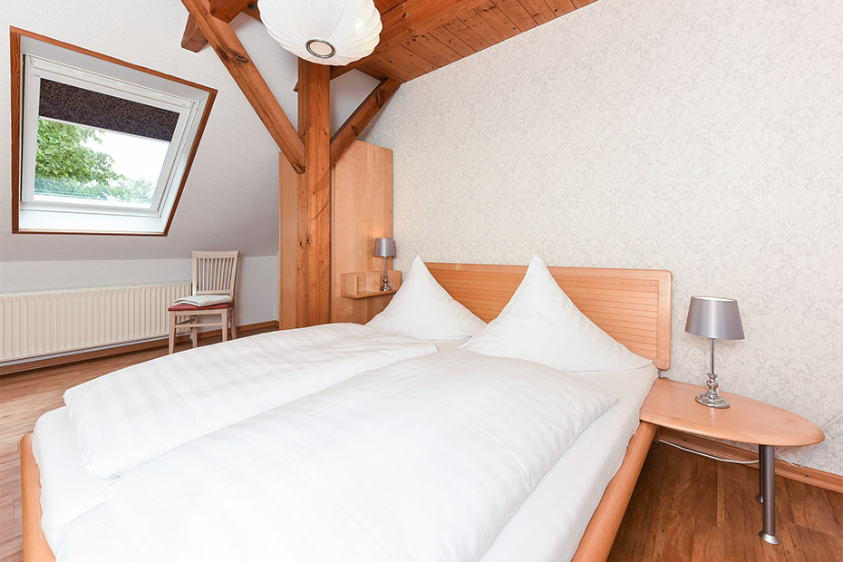 Ferienwohnung Erlenwohnung - Schlafzimmer 1