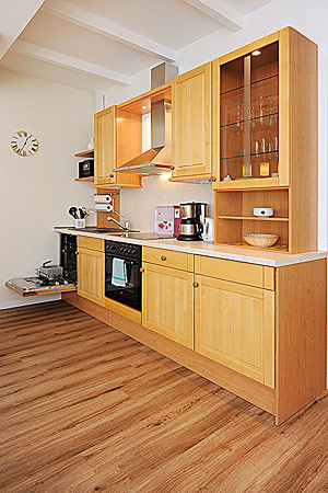 Ferienwohnung Milchkammer 4 - Wohnzimmer mit integriertem Küchenbereich