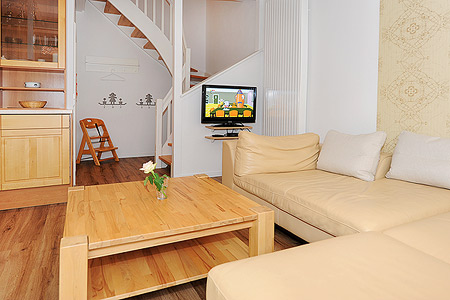 Ferienwohnung Milchkammer 4 - Wohnzimmer mit integriertem Küchenbereich