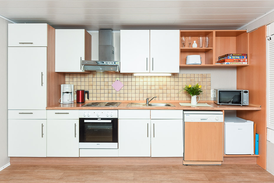 Ferienwohnung „Ost“ - Wohnzimmer mit integriertem Küchenbereich