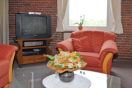 Ferienwohnung - Wohnzimmer mit integriertem Küchenbereich