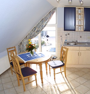 Ferienwohnung - Wohnzimmer mit integriertem Küchenbereich