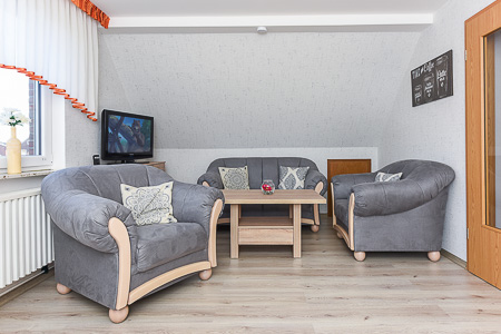 Ferienwohnung - Wohnzimmer mit integriertem Küchenbereich