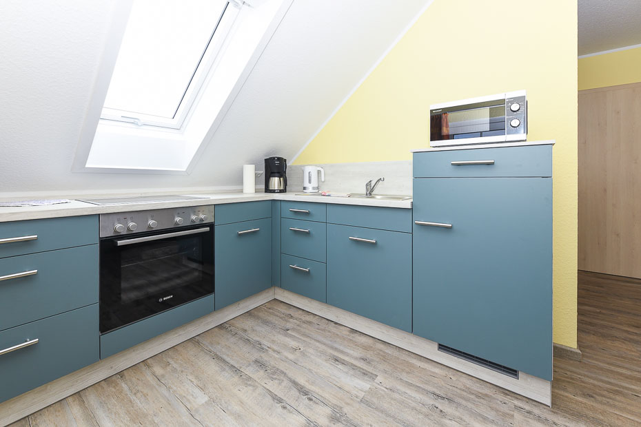 Ferienwohnung „Klein“ - Wohnzimmer mit integriertem Küchenbereich