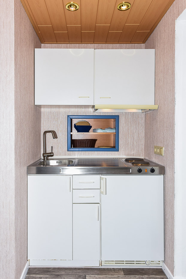 Ferienwohnung „Haus Janssen“ - Wohnzimmer mit integriertem Küchenbereich