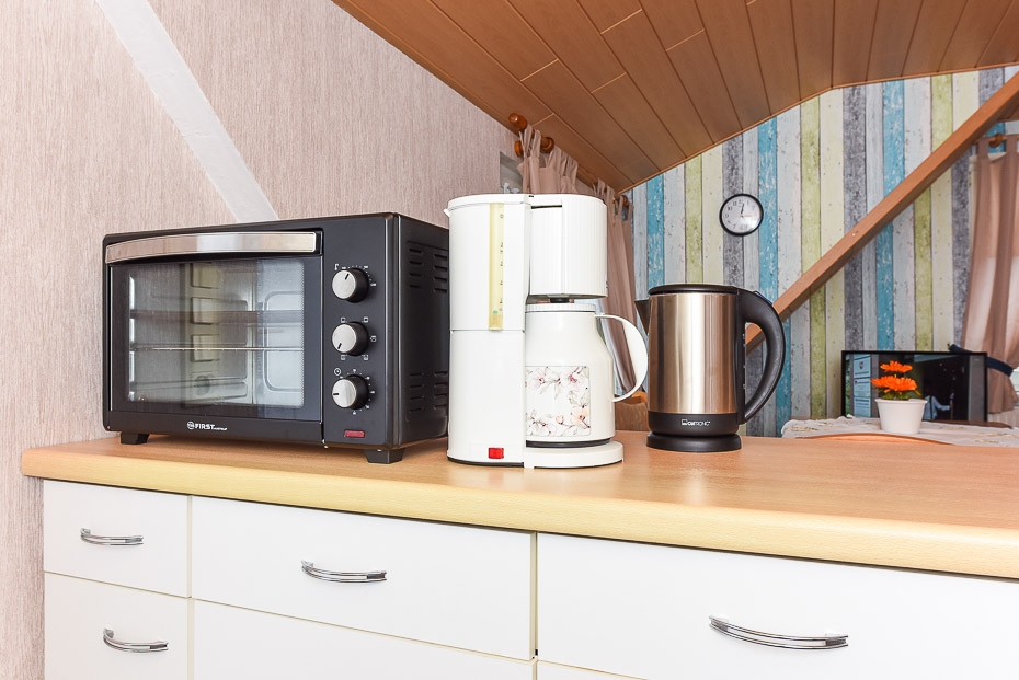 Ferienwohnung „Haus Janssen“ - Wohnzimmer mit integriertem Küchenbereich