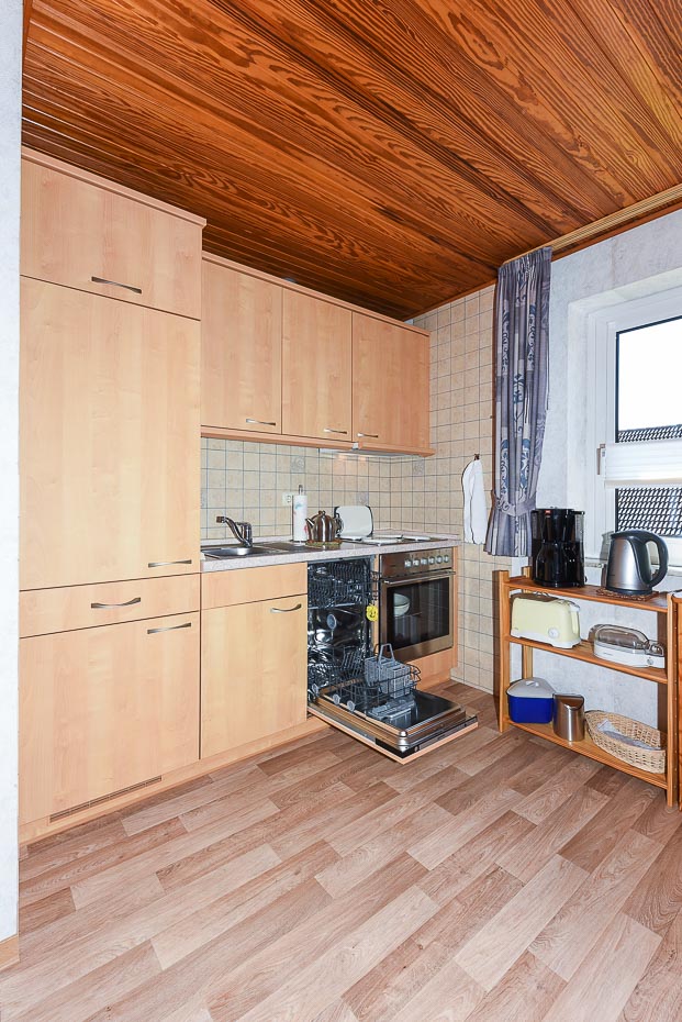 Ferienwohnung „Vosskamp Hörn“ - Wohnraum mit integrierter Küche