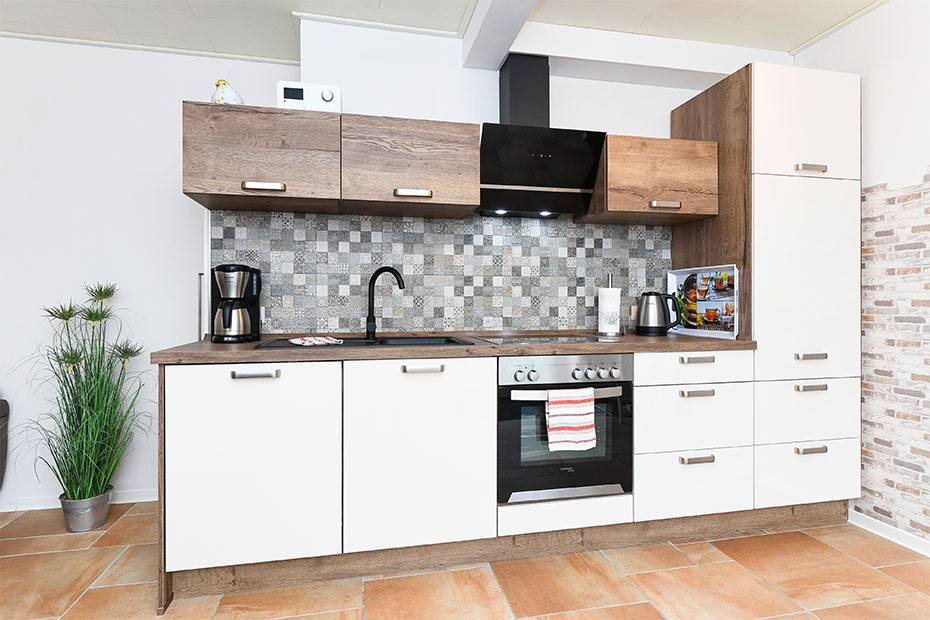 Ferienwohnung 1 - Wohnzimmer mit integriertem Küchenbereich