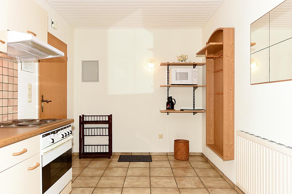 Ferienwohnung „Langeoog“ - Wohnzimmer mit integriertem Küchenbereich