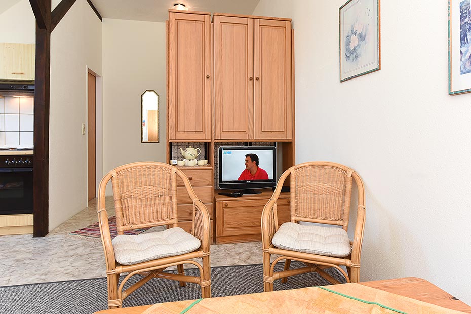 Ferienwohnung „Wangerooge“ - Wohnzimmer mit integriertem Küchenbereich