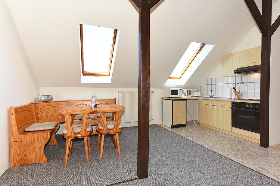 Ferienwohnung „Wangerooge“ - Wohnzimmer mit integriertem Küchenbereich