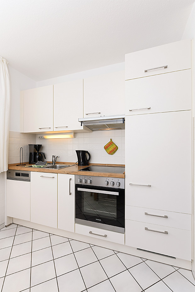 Ferienwohnung 4c - Wohnzimmer mit integriertem Küchenbereich