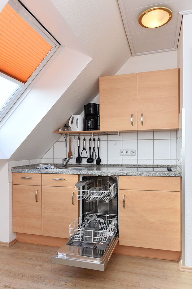 Ferienwohnung „Nordlicht“ - Wohnzimmer mit integriertem Küchenbereich