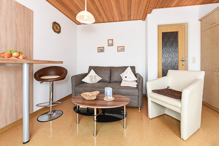 Ferienwohnung IV - Wohnzimmer mit integriertem Küchenbereich