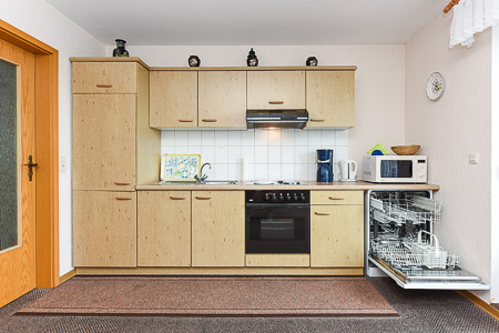 Ferienwohnung VI - Wohnzimmer mit integriertem Küchenbereich