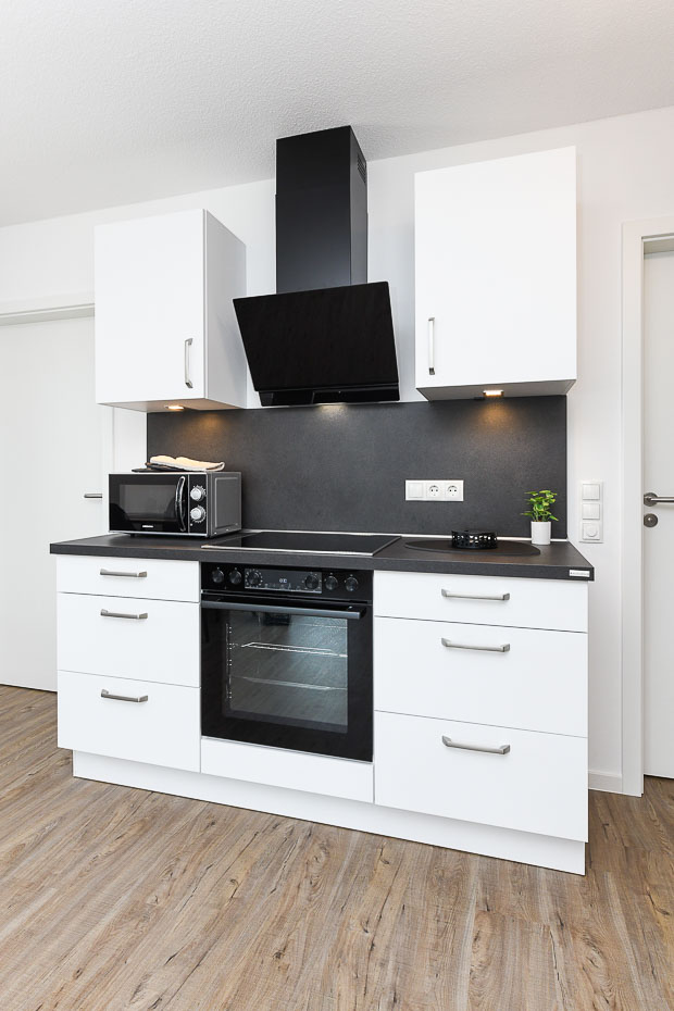 Ferienwohnung „Auszeit“ - Wohnzimmer mit integriertem Küchenbereich