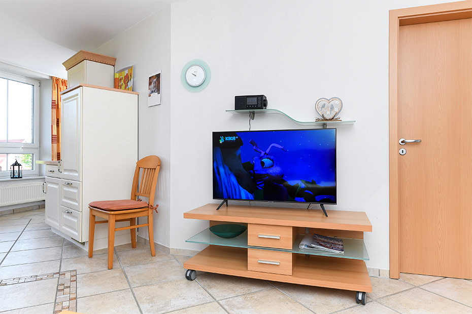 Ferienwohnung „Grafthof“ - Wohnzimmer mit integriertem Küchenbereich