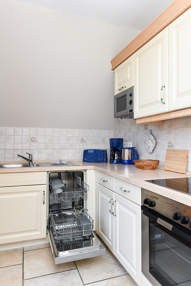 Ferienwohnung „Grafthof“ - Wohnzimmer mit integriertem Küchenbereich