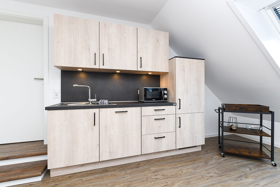 Ferienwohnung „Upkammer“ - Wohnzimmer mit integriertem Küchenbereich