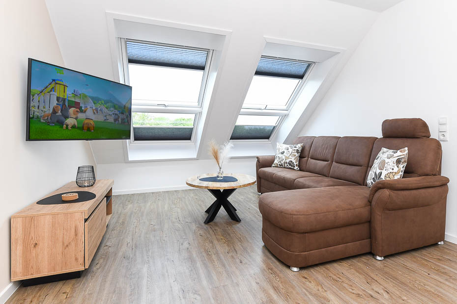 Ferienwohnung „Weitsicht“ - Wohnzimmer mit integriertem Küchenbereich