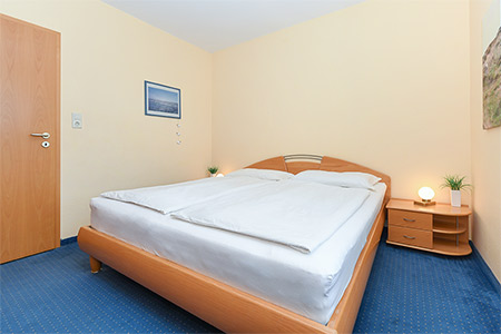 Ferienwohnung „Hafenmelodie“ - Schlafzimmer 1