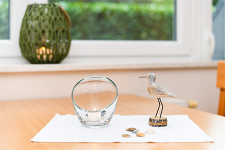 Ferienwohnung „Seehund“ - Wohnzimmer mit integriertem Küchenbereich