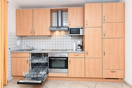 Ferienwohnung „Seehund“ - Wohnzimmer mit integriertem Küchenbereich