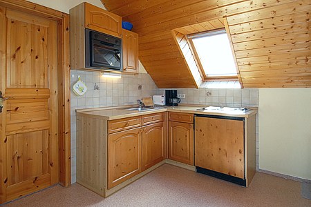 Apartment „Seeadler“ - Wohn- und Schlafraum mit integriertem Küchenbereich