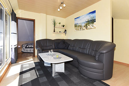 Ferienwohnung - Wohnraum und Esszimmer