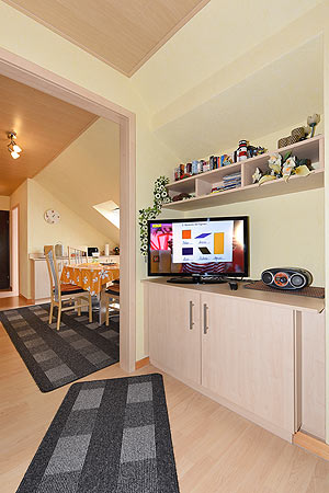 Ferienwohnung - Wohnraum und Esszimmer