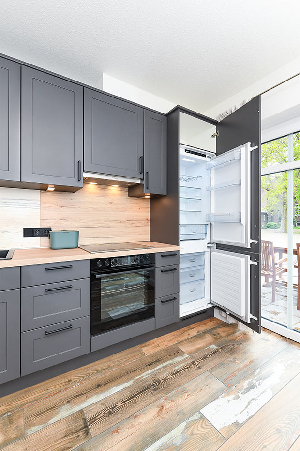 Ferienwohnung „Hühnerstall“ - Wohnzimmer mit Essplatz und integrierter Küche