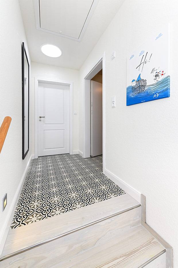 Ferienwohnung „Taubenschlag“ - Treppenaufgang und Flur