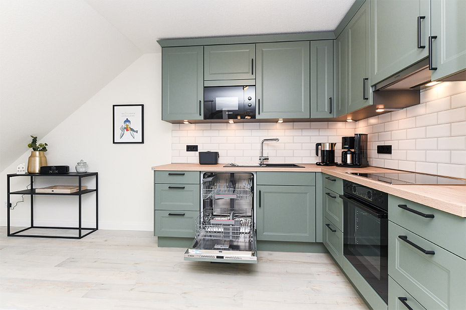 Ferienwohnung „Taubenschlag“ - Wohnzimmer mit Essplatz und integrierter Küche