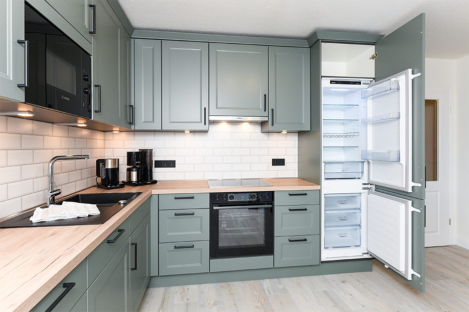 Ferienwohnung „Taubenschlag“ - Wohnzimmer mit Essplatz und integrierter Küche