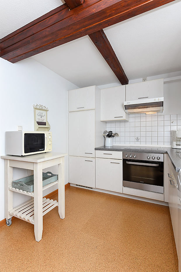 Ferienwohnung „West“ - Wohnzimmer mit integriertem Küchenbereich