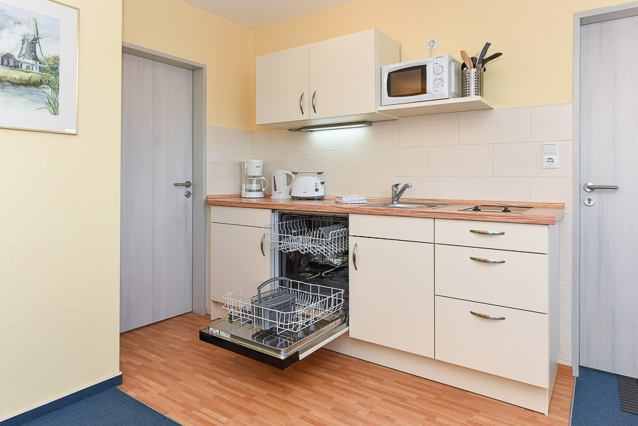 Ferienwohnung „Besan“ - Wohnzimmer mit integriertem Küchenbereich