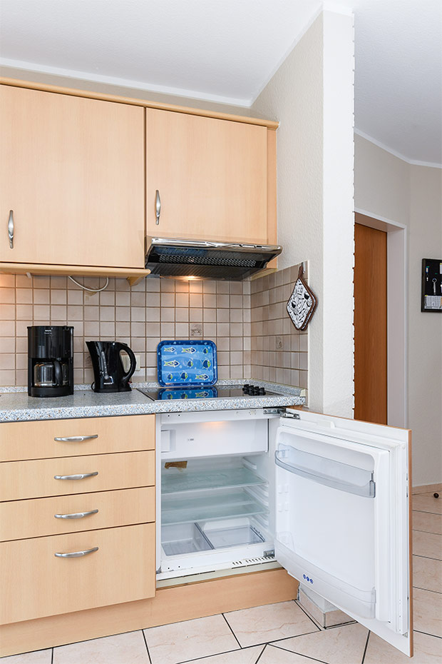 Ferienwohnung „Baltrum“ - Wohnzimmer mit integriertem Küchenbereich