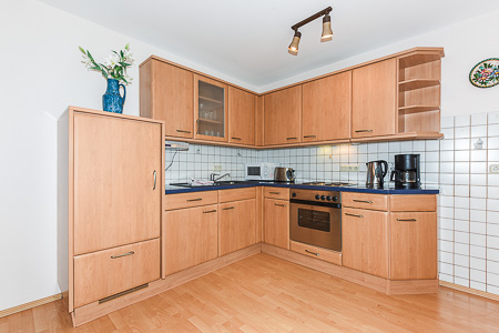 Ferienwohnung 1 - Wohnzimmer mit integriertem Küchenbereich