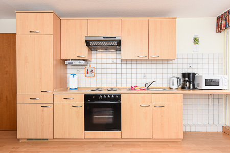 Ferienwohnung 3 - Wohnzimmer mit integriertem Küchenbereich