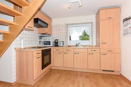 Ferienwohnung 5 - Wohnzimmer mit integriertem Küchenbereich